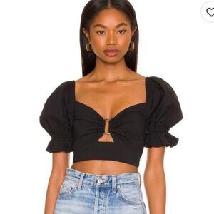 Black Puff-Sleeve Crop Top with Front Cutout more to come revolve s